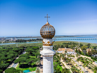 Aerial view of the pinnacle with the croix of the Monument to the Discoverers, also known as Columna del IV Centenario, in La Rabida, Palos de la Frontera, dedicated to the discoverers of America