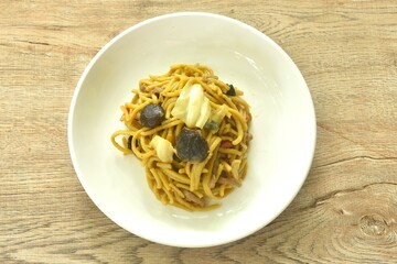 fried yakisoba Japanese noodles and cabbage with mushroom on plate