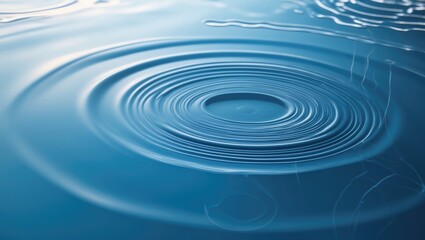 Blue water background featuring ripples and drops
