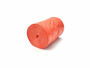 Roll of red garbage bags isolated on white background	