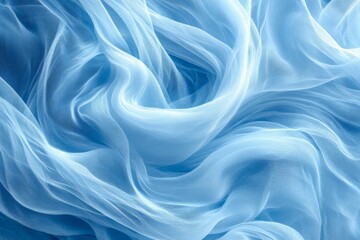 Obraz premium Soft blue fabric undulating in gentle waves creating a tranquil and airy atmosphere in an artistic display