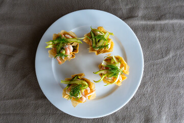 Stockholm, Sweden Small pastries filled with shrimp and sliced asparagus.