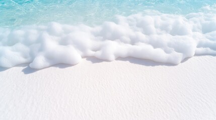 Fototapeta premium Soft waves gently lapping on pristine white sand