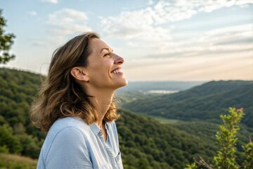 Happy woman enjoying nature, deep in thought with a positive mindset. Smiling, feeling inspired and relaxed in a peaceful outdoor environment. (People)