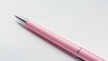 White Background with a Pink Ballpoint Pen