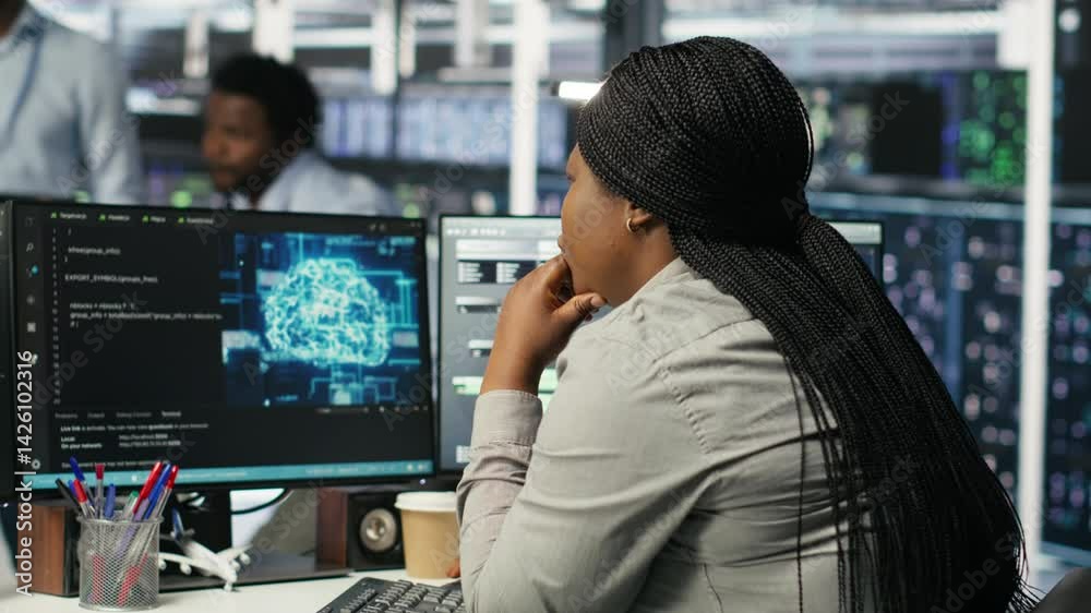 Poster data center staff member in office using ai deep learning algorithms to analyze datasets. african am