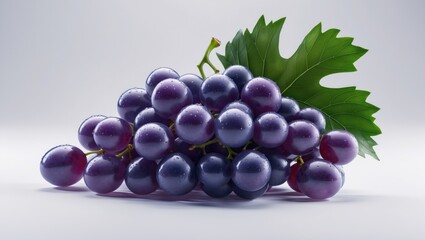 Fototapeta premium Juicy fresh blue grapes with green leaf on white background