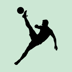 vector illustration of a silhouette of a soccer player kicking a ball in a bicycle kick style.