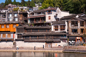 Fenghuang ancient town, China. Traditional chinese wooden houses in old watertown