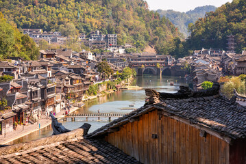 Panoramic view of Fenghuang ancient town, China. Traditional chinese wooden houses in old watertown