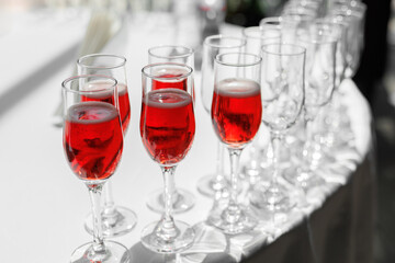 Wine glasses at the banquet, wine in wine glasses, buffet.