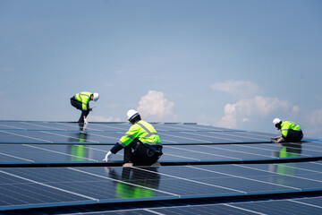 Engineer team installs solar cells check installation solar cell on the roof Sustainable energy industry concept Renewable energy solutions for climate change..