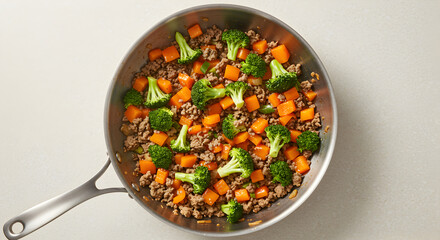 Ground Meat With Broccoli And Sweet Potato Cooking In Skillet