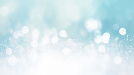 Fototapeta premium Abstract bokeh background with soft blue and white colors for creative designs and copy space