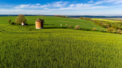chvalkovice windmill in spring landscape captured by drone..