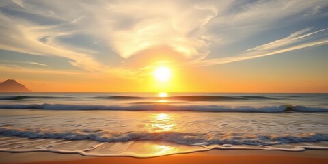 Obraz premium Golden sunrise paints the sky over calm ocean waves on a sandy beach, gold, calm