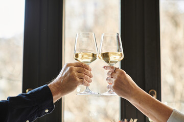Celebrating love and connection at a cozy cafe with heartfelt toasts