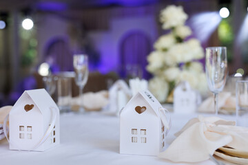 Wedding decorations made of white flowers. Decor of the ceremony and table of the bride and groom