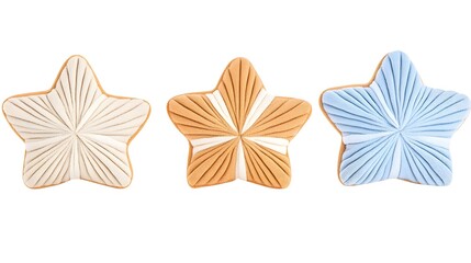 Obraz premium Three star-shaped cookies in beige, tan, and light blue