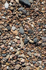Close-Up View of a Colorful Pebble Beach on a Sunny Day