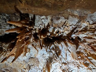 stalagmites and stalactites underground in cosmic cave cavern Arkansas Eureka Springs