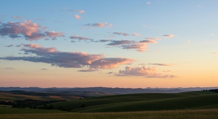 Obraz premium Serene Sunset Over Rolling Hills - Peaceful sunset landscape, symbolizing tranquility, nature's beauty, boundless horizons, serenity, and hope