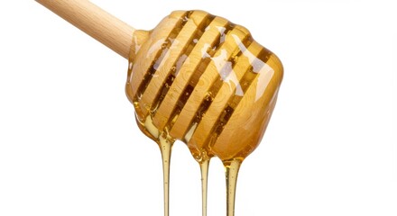 Golden delight: A honey dipper cascades a stream of sweet nectar in a studio setting