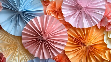 Colorful paper fan decorations create a vibrant backdrop.