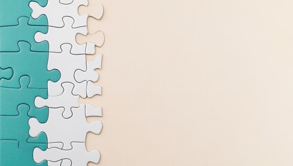 Teal and white puzzle pieces aligned on beige background, leaving ample space for text or design
