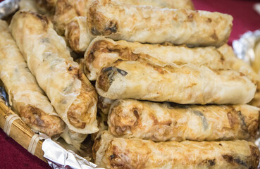 Aromatic crunchy spring rolls with meat and vegetables. Traditional Chinese cuisine