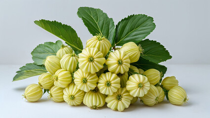 Group Of Pattypan Squash With Green Leaves On A White Background