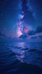 Obraz premium Dark ocean waters reflect vibrant starry night sky with swirling patterns of blue and purple hues, ocean, night sky