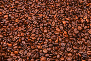 Coffee beans background. Top view. Coffee beans texture.