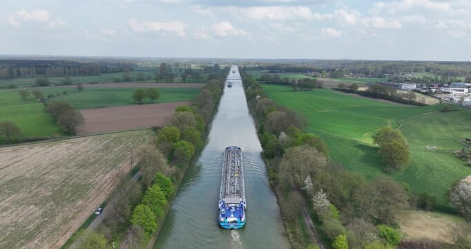 Wesel Datteln canal, inland transportation by ships. Commercial industrial trade and logisitcs over water in Germany.