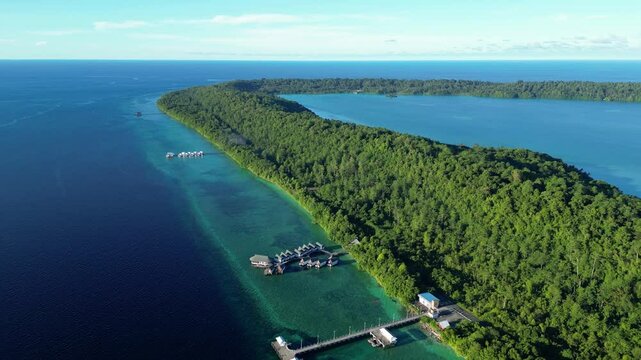 Maratua, Indonesia: Aerial drone footage of overwater bungalow in the idyllic Maratua island in the Derawan archipelago in Kalimantan in Indonesian Borneo. 