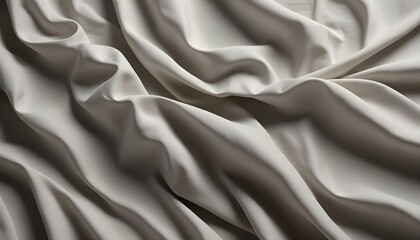 Fototapeta premium An elegant image displays the graceful folds and shadows of smooth, soft fabric.
