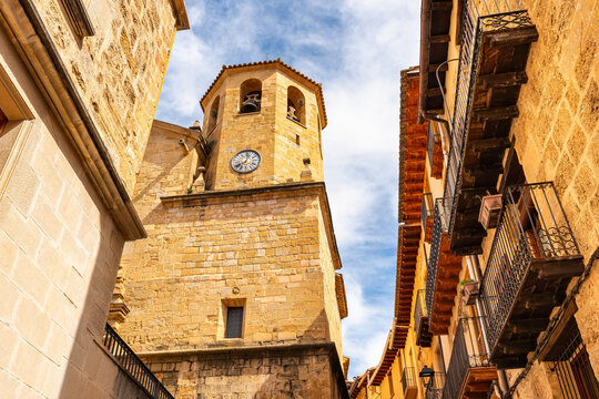 Medieval stone church with tower and bell tower in the picturesque town of Beceite, Teruel.