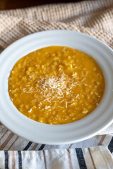 homemade Italian recipe called pastina with creamy vegetables and cheese