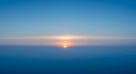 Fototapeta premium Sunset Over Mountains at Dusk