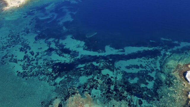 Breathtaking Aerial View of Foca Coastline Embracing Turquoise Aegean Sea in Izmir, Turkiye