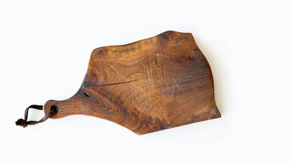 Wooden cutting board on background