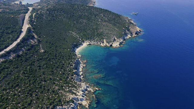 Breathtaking Aerial View of Foca Coastline Embracing Turquoise Aegean Sea in Izmir, Turkiye