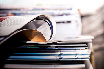 stack of open book in library