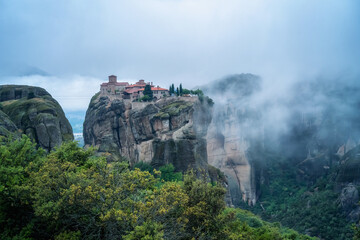 Amazing panoramic view with the majestic Holly Trinity Monastery in the Meteora Valley near Kastraki, Greece
