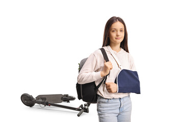 E-scooter riding accident and a female teenage student with an arm sling