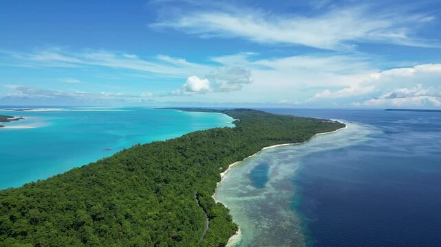 Maratua, Indonesia: Aerial drone footage of Maratua island with its turquoise lagoon in the Derawan archipelago in Kalimantan in Indonesian Borneo. 