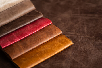 Leather Swatches in Rich Tones Red, Brown and Cognac Faux Leather Samples on Dark Background