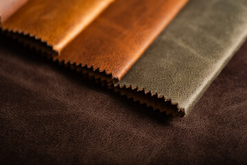 Leather Swatches in Rich Tones Red, Brown and Cognac Faux Leather Samples on Dark Background