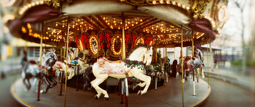 Panoramic view of carousel horses in an amusement park, Seattle Center, Queen Anne Hill, Seattle, Washington State, USA.