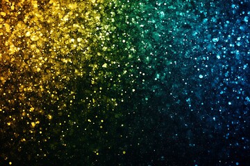 Abstract glittering gradient with golden, green, and blue particles on dark background
